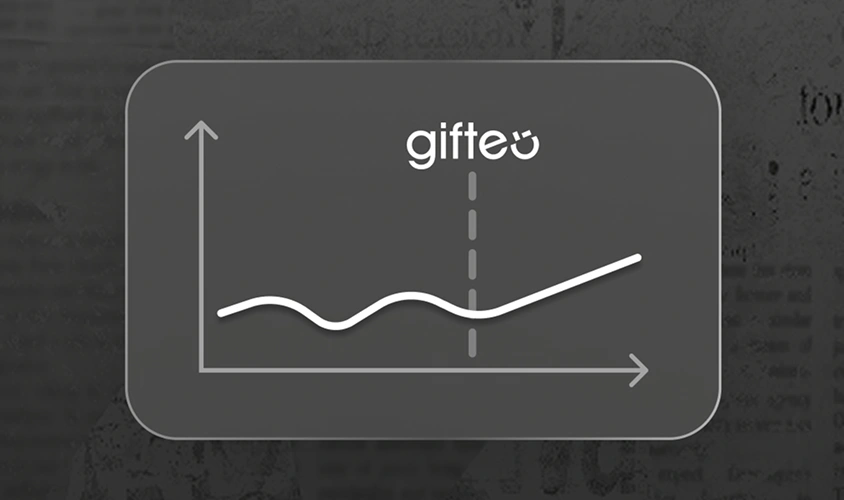 Gray rounded panel with a simple white line graph showing a fluctuating trend and a dashed vertical reference line, with a 'gifte' logo above the chart.